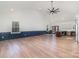 Open living room with high ceilings, dark blue wainscoting, and hardwood floors at 108 Robinson Dr, Cherryville, NC 28021