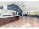Bright open-concept living area with modern kitchen, wood floors, high ceilings, and abundant natural light at 108 Robinson Dr, Cherryville, NC 28021