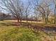 Open area with leafless trees and grassy field at 117 Mardon Ln, Statesville, NC 28677