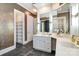 The bathroom has double vanities, and a walk-in closet with custom shelving at 1333 Carlton Ave, Charlotte, NC 28203