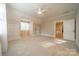 Spacious bedroom with neutral carpet, built-in storage, and natural light at 1333 Carlton Ave, Charlotte, NC 28203