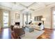 Bright living room with coffered ceiling, fireplace, and comfortable seating arrangement at 1333 Carlton Ave, Charlotte, NC 28203
