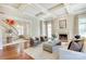 Spacious living room with hardwood floors, fireplace, and seamless flow to the foyer at 1333 Carlton Ave, Charlotte, NC 28203