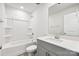 Bathroom featuring a shower-tub combo and a vanity with grey cabinets and white countertop at 1515 Harper Landing Blvd, Stanley, NC 28164