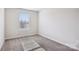 Bedroom featuring carpet flooring, neutral walls and a bright window at 1515 Harper Landing Blvd, Stanley, NC 28164