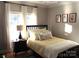 Bright bedroom with a comfortable bed and plenty of natural light at 1601 Eden Glen Dr, Dallas, NC 28034