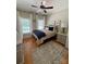 Cozy bedroom with hardwood floors and two windows, providing lots of natural light at 1601 Eden Glen Dr, Dallas, NC 28034