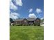 Beautiful single-story brick house with arched windows and a well-maintained lawn at 1601 Eden Glen Dr, Dallas, NC 28034