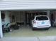 Spacious garage with car and storage shelving at 1601 Eden Glen Dr, Dallas, NC 28034