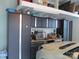Organized garage with overhead storage and workbench at 1601 Eden Glen Dr, Dallas, NC 28034