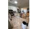Functional kitchen with white cabinetry, stainless steel appliances, and a tile floor at 1601 Eden Glen Dr, Dallas, NC 28034