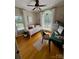 Cozy office with computer and two windows offering natural light at 1601 Eden Glen Dr, Dallas, NC 28034