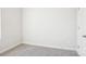 Cozy bedroom featuring neutral carpeting and a large window for natural light at 1608 Village Grove Ln, Monroe, NC 28110