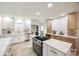 Modern kitchen with white cabinets, marble countertops, and island at 1612 Bowater Rd, Rock Hill, SC 29732