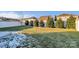 Landscaped backyard with lush lawn and privacy fence at 163 Paradise Hills Cir, Mooresville, NC 28115