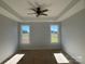 Spacious bedroom with two large windows and ceiling fan at 208 Beths Ct # 35, York, SC 29745