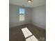 Spacious bedroom with a large window and sunlight streaming through at 208 Beths Ct # 35, York, SC 29745