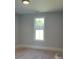 Bedroom with large window offering natural light and neutral wall color at 208 Beths Ct # 35, York, SC 29745