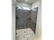 Large walk-in shower with gray tile and glass enclosure at 208 Beths Ct # 35, York, SC 29745