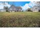 Large backyard with two buildings at 2913 & 2901 Wesleyan Church Rd, Lincolnton, NC 28092