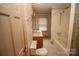Bathroom with tub, shower, and updated vanity at 2913 & 2901 Wesleyan Church Rd, Lincolnton, NC 28092