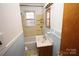 Bathroom with tub, sink, and vanity at 2913 & 2901 Wesleyan Church Rd, Lincolnton, NC 28092