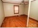 Bright bedroom with hardwood floors and ample natural light at 2913 & 2901 Wesleyan Church Rd, Lincolnton, NC 28092