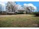 Ranch home with carport and landscaped yard at 2913 & 2901 Wesleyan Church Rd, Lincolnton, NC 28092