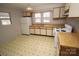 Kitchen features wood cabinets and flooring at 2913 & 2901 Wesleyan Church Rd, Lincolnton, NC 28092