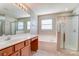 Bathroom boasts double sinks, garden tub, and a separate shower at 3043 Streamlet Way, Monroe, NC 28110
