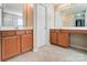 Double vanity bathroom with ample storage and a shared wall at 3043 Streamlet Way, Monroe, NC 28110