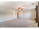 Spacious bedroom with ceiling fan and large window at 3043 Streamlet Way, Monroe, NC 28110