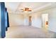 Spacious carpeted bedroom with ceiling fan and ensuite bathroom access at 3043 Streamlet Way, Monroe, NC 28110