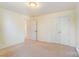 Bedroom with double closet and access to hallway at 3043 Streamlet Way, Monroe, NC 28110