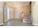 Bright entryway with tile flooring, staircase, and a coat closet at 3043 Streamlet Way, Monroe, NC 28110