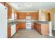 Kitchen with granite countertops and wood cabinets at 3043 Streamlet Way, Monroe, NC 28110