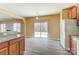 Kitchen with sliding door leading to backyard access at 3043 Streamlet Way, Monroe, NC 28110