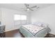 Bright bedroom with hardwood floors, a ceiling fan, and a window with blinds at 3071 Brookchase Blvd, Fort Mill, SC 29707