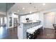 Modern kitchen with white cabinets, granite counters & breakfast bar at 3121 Glenmoor Rd, York, SC 29745