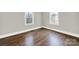 Well-lit bedroom with hardwood floors and neutral decor at 409 Jones S Ave, Rock Hill, SC 29730