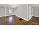 A simple but spacious bedroom with beautiful hardwood floors and a simple design at 409 Jones S Ave, Rock Hill, SC 29730