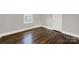 Bright bedroom with hardwood floors and neutral walls at 409 Jones S Ave, Rock Hill, SC 29730