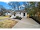 Newly renovated home with a deck and freshly landscaped yard at 409 Jones S Ave, Rock Hill, SC 29730