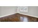 Bright and airy living room with hardwood floors and large windows at 409 Jones S Ave, Rock Hill, SC 29730