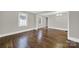 Spacious living area with hardwood floors and neutral walls at 409 Jones S Ave, Rock Hill, SC 29730