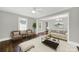 Inviting living room with hardwood floors, large window, and neutral paint palette at 409 Jones S Ave, Rock Hill, SC 29730