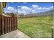 Private backyard with wooden fence and grassy area at 438 Stoneycreek Ln, Rock Hill, SC 29730