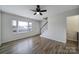Spacious living room with hardwood floors and a bay window at 438 Stoneycreek Ln, Rock Hill, SC 29730