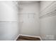 Spacious closet with wire shelving and ample hanging space at 4603 Babbling Brook Ct, Indian Trail, NC 28079