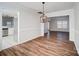 Bright dining room with hardwood floors and kitchen view at 4603 Babbling Brook Ct, Indian Trail, NC 28079